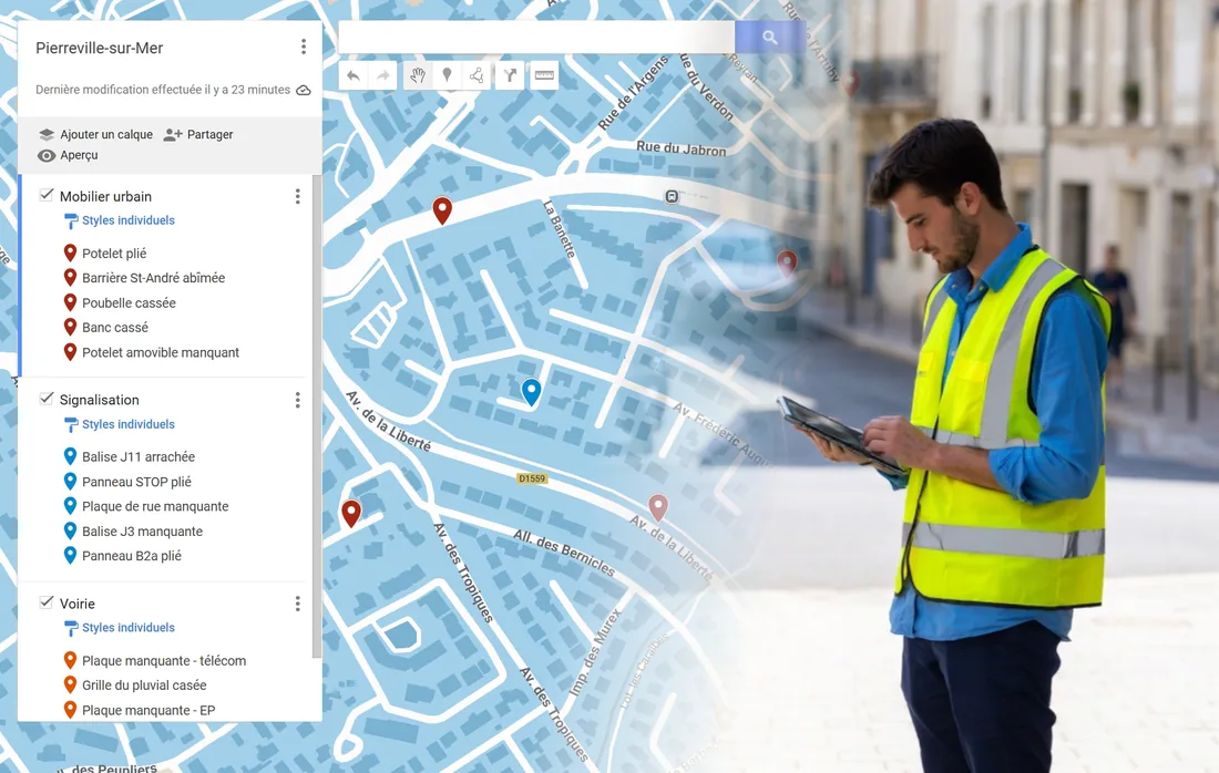 Technicien en gilet jaune consultant une tablette, devant la carte des défauts relevés